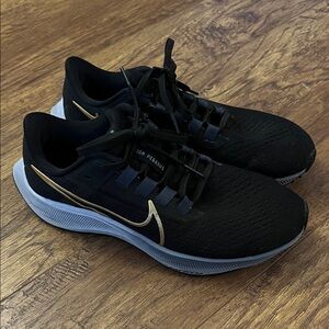 Nike Women’s Black and Gold Athletic Shoes